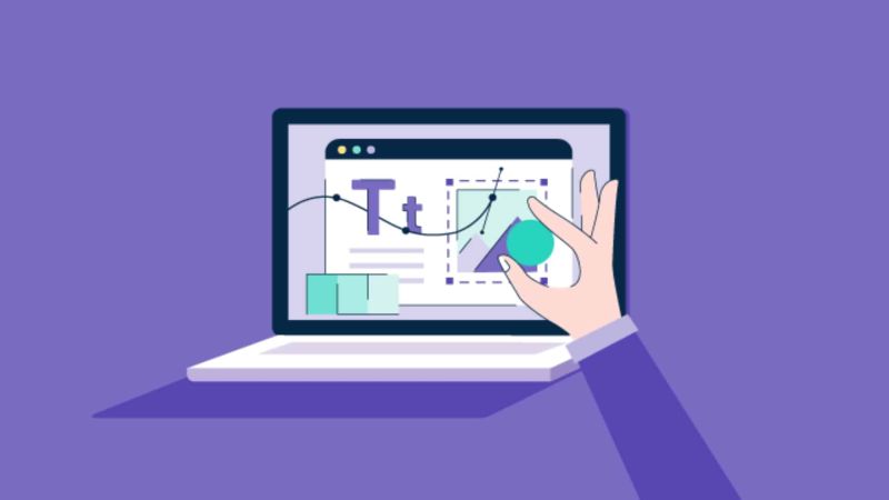 Illustration of hand in front of laptop creating landing page